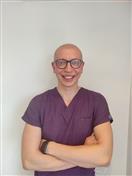 Dr. Hasan Onur Akin, Dt., Periodontology Specialist and Oral Surgeon